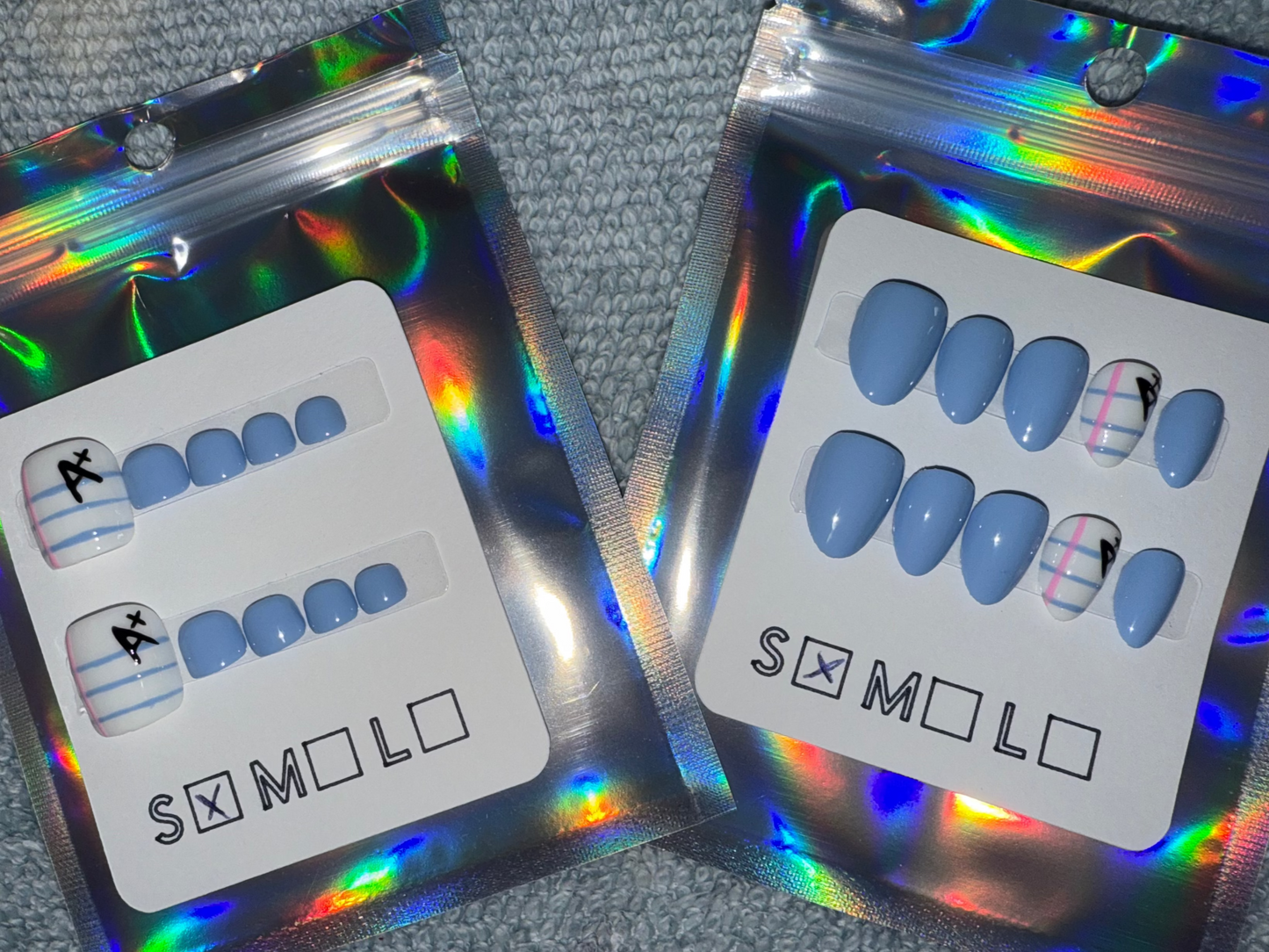 Light Blue Press-On Nails with Notebook Paper & A+ Accent – Extra Short Almond Shape